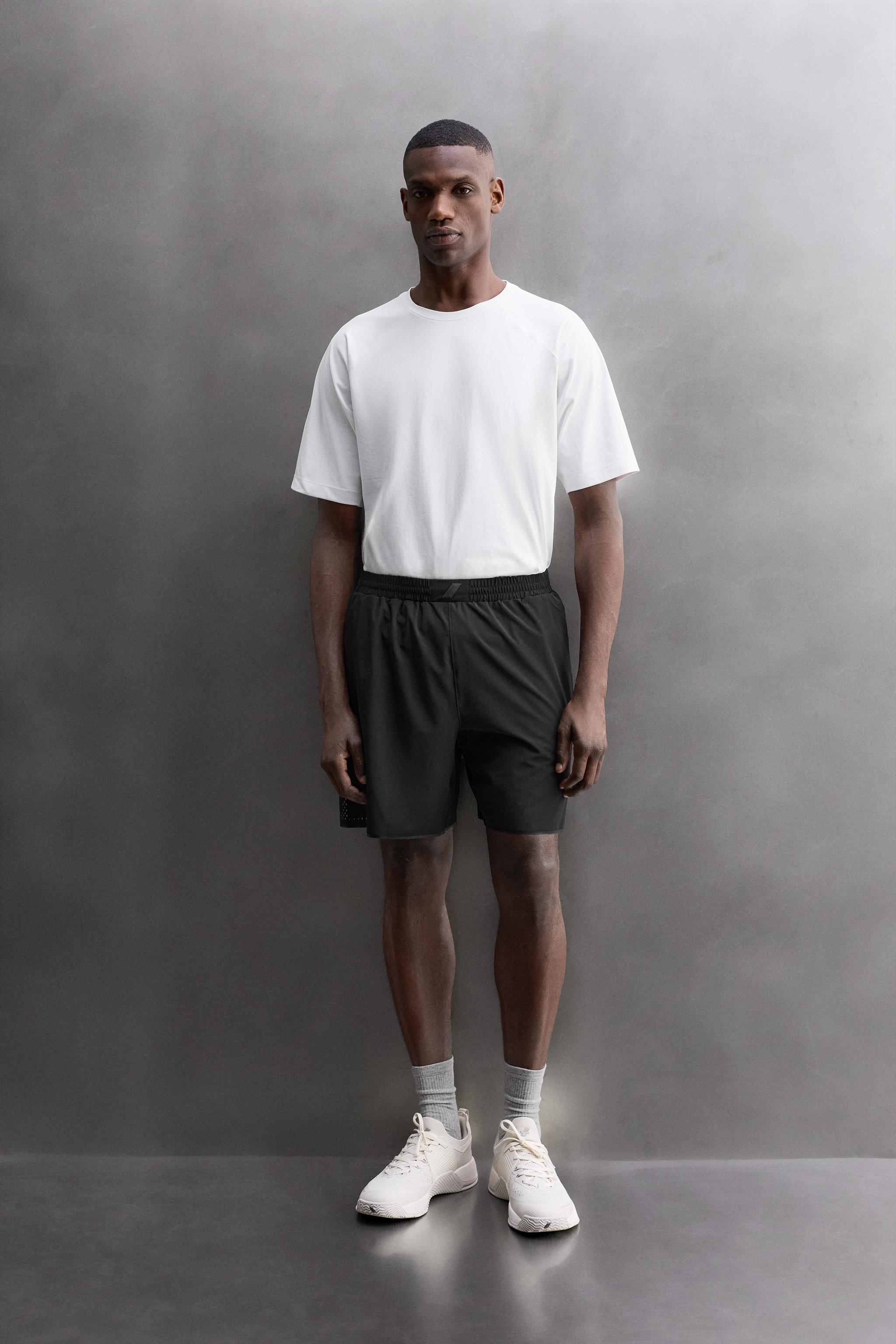 SHORT EN TISSU PERFORÉ 9''